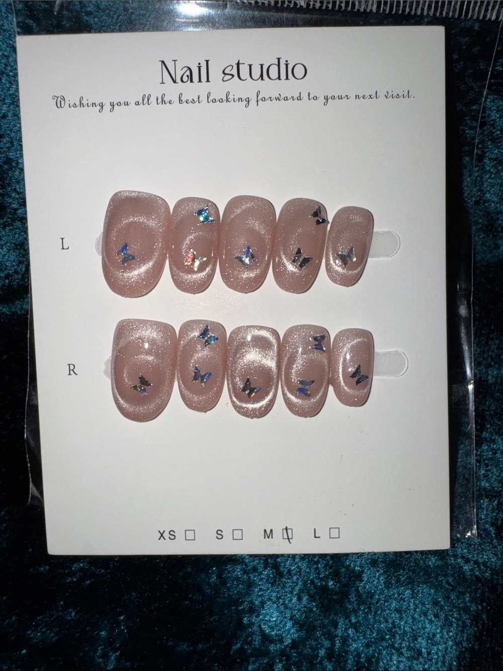 Nude Pink Shimmery Nails with Holographic Butterfly Accents
